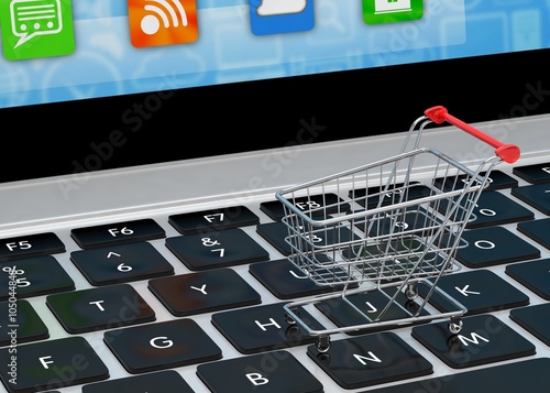 Shopping cart on laptop. 