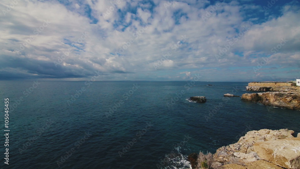 Panning shot of a beautiful sea and blue sky with clouds. Island Tabarca.Spain. Panning shot of a beautiful sea and blue sky with clouds. Island Tabarca.Spain.