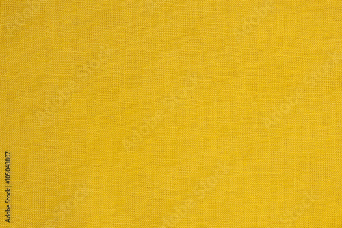 Close-up of a yellow fabric textile texture photo