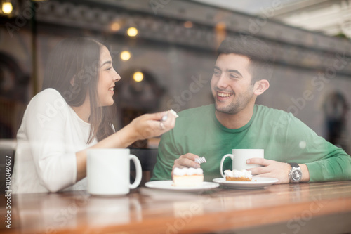 Boyfriend and girlfriend in a coffee shop