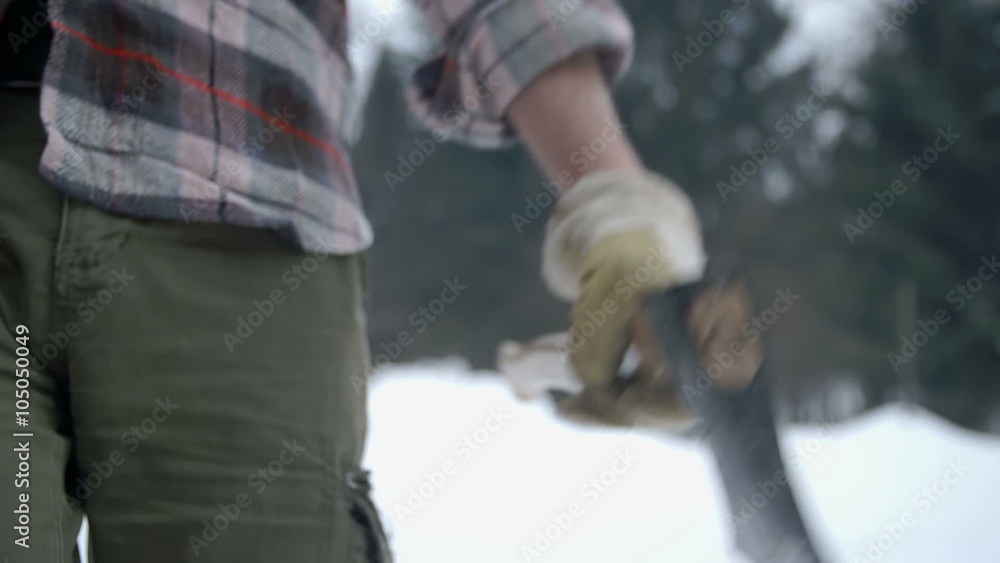 Walking home from forest with an axe in his hands Walking home from forest with an axe in his hands