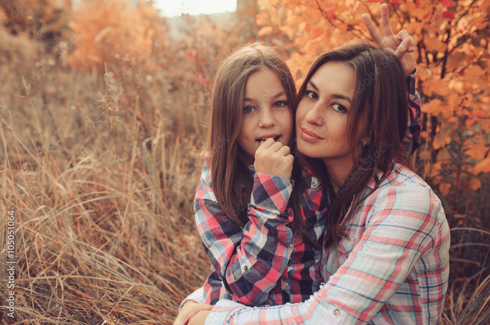 happy mother and daughter on the walk on summer field. Family spending vacation outdoor, lifestyle capture., cozy mood happy mother and daughter on the walk on summer field. Family spending vacation outdoor, lifestyle capture., cozy mood
