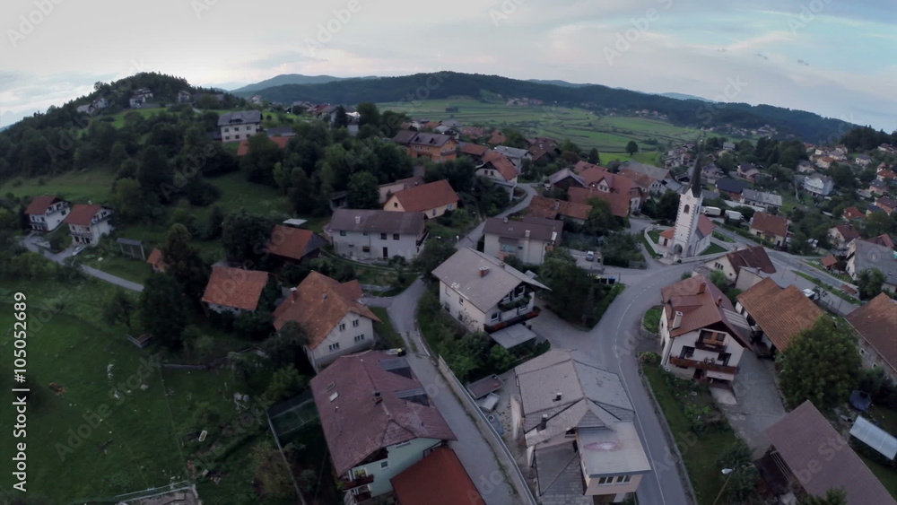 Aerial shoot of village at summer sunset Aerial shoot of village at summer sunset