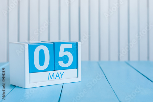 May 5th. Image of may 5 wooden color calendar on white background.  Spring day, empty space for text. International disabled rights  Day  