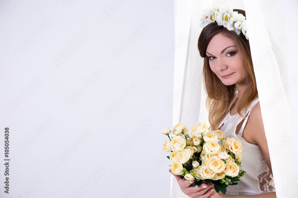 portrait of beautiful bride in white dress with flowers and copy portrait of beautiful bride in white dress with flowers and copy
