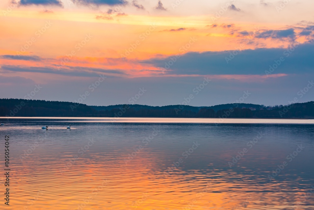 Lake landscape at colorful sunset