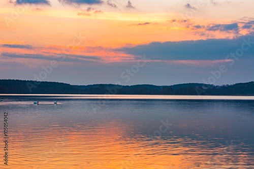 Lake landscape at colorful sunset
