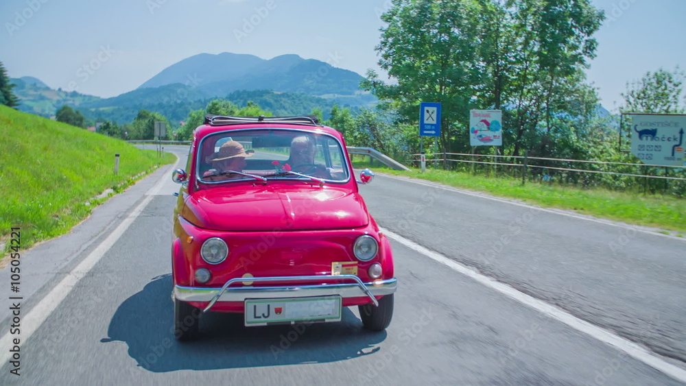 Red yugo driving