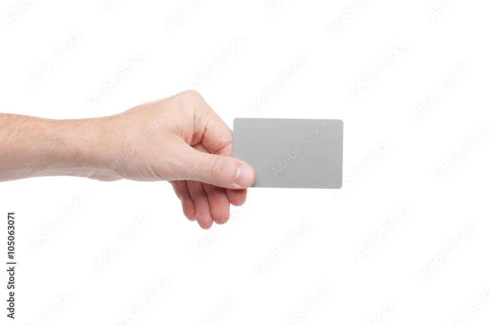 gray card in a human hand isolated on white background gray card in a human hand isolated on white background
