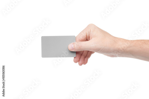 gray card in a human hand isolated on white background