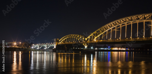 Cologne, Germany - March 11, 2016: Cologne Rheinauhafen at night showing a rhine bridge