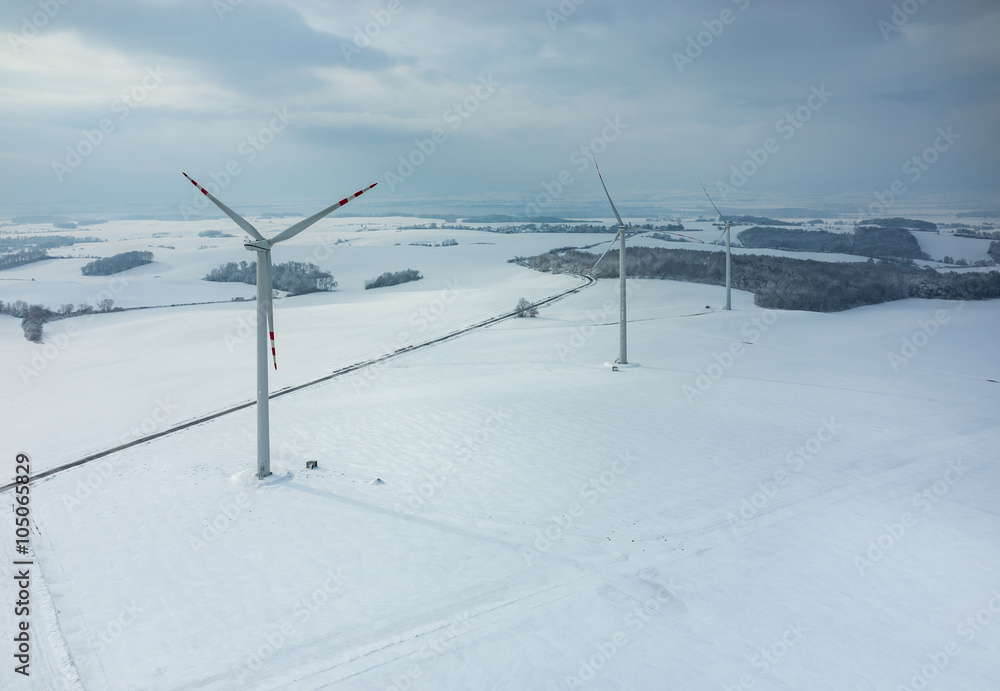 Windmill on the field in winter Windmill on the field in winter