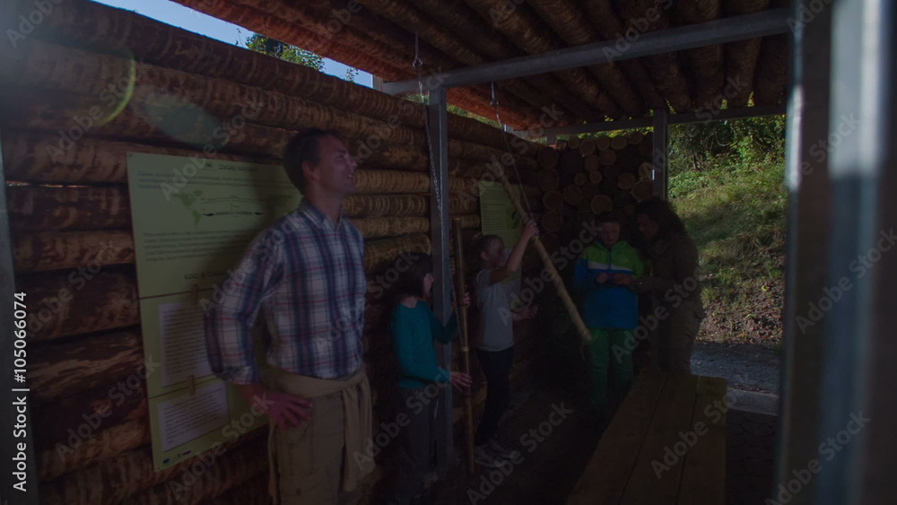 Couple take a brake in the wooden house full of children Couple take a brake in the wooden house full of children