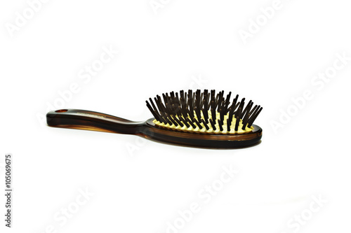 Used comb with hair isolated on white background for pattern