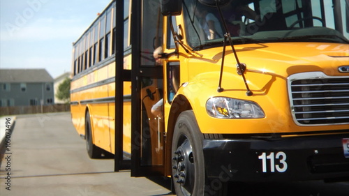 Children get off school bus