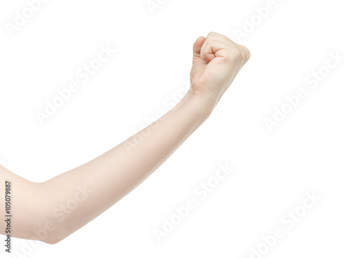 young female hand shows fist, isolated on white background