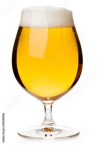 Full snifter glass of pale lager of pilsner beer isolated on white background