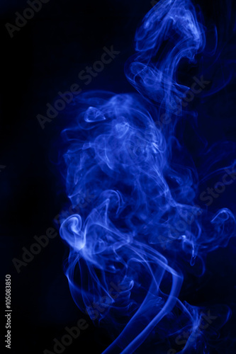 Fototapeta Naklejka Na Ścianę i Meble -  Blue smoke on a black background.