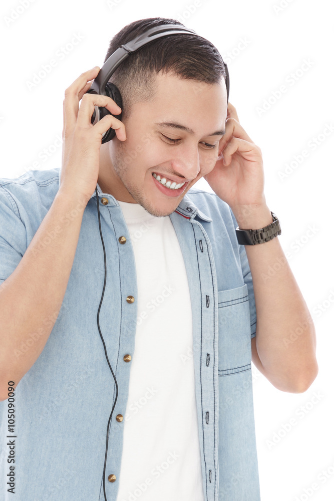 casual young man wearing headphones casual young man wearing headphones