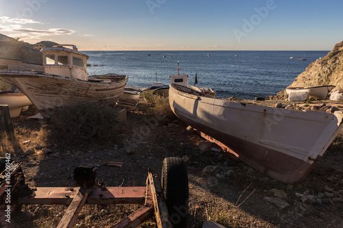 Old fishing boats stranded on the coast. La Isleta. Natural Park of Cabo de Gata. Spain.