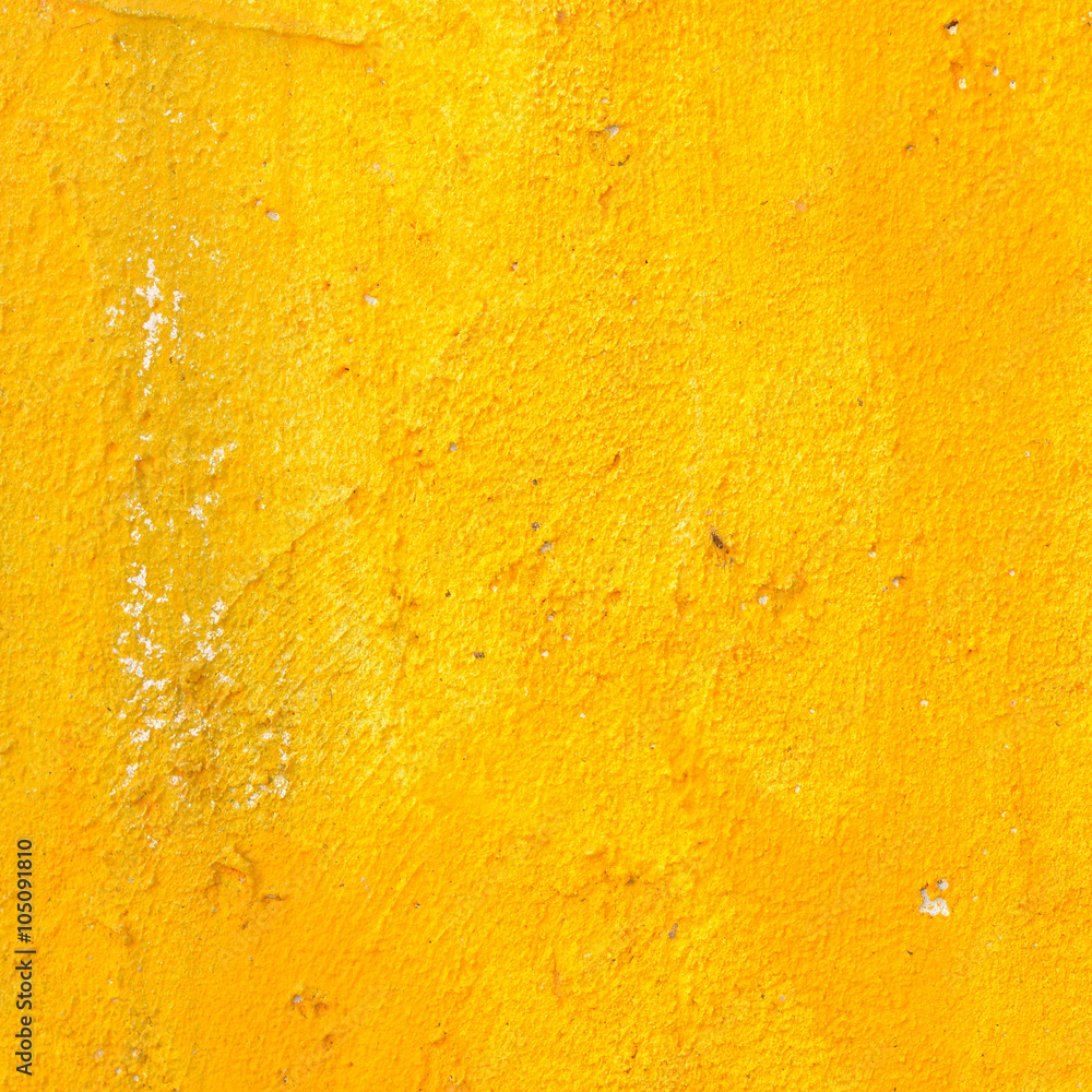 Yellow grunge cement wall for texture background Yellow grunge cement wall for texture background