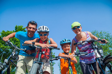Family riding bikes