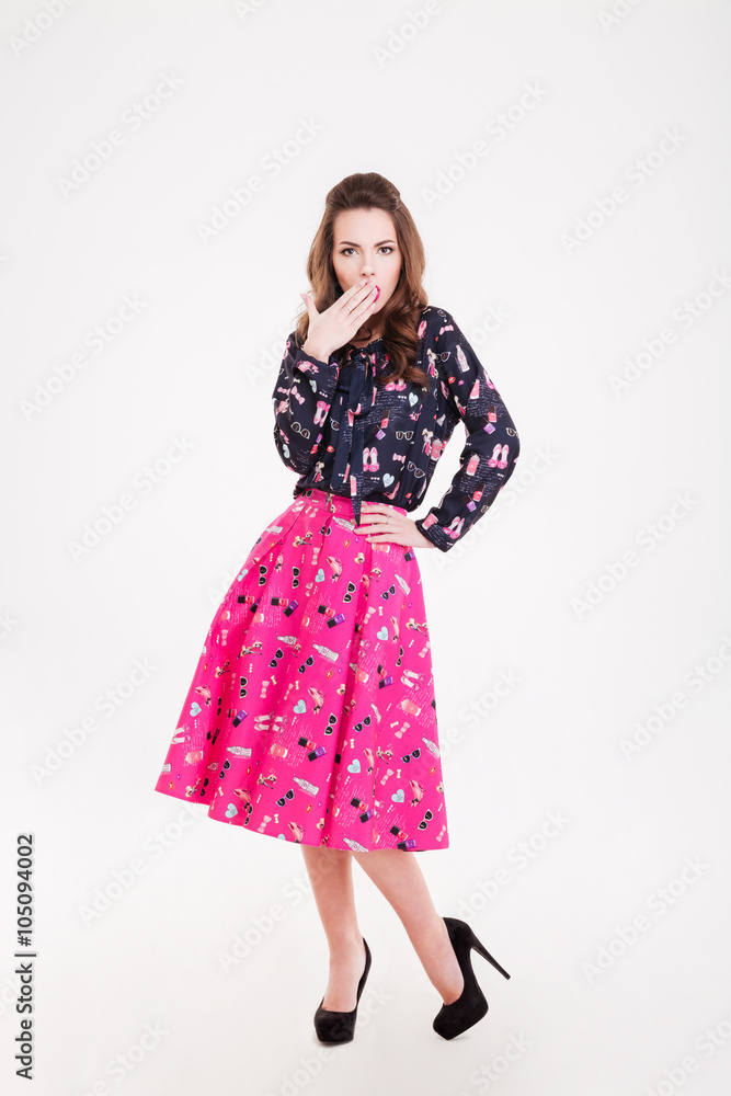 Amazed pretty young woman covered mouth with hand Amazed pretty young woman covered mouth with hand