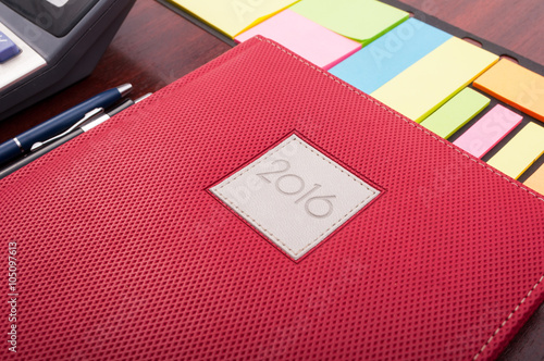 Wallpaper Mural Close-up of organized workplace with an organizer on wooden desk Torontodigital.ca