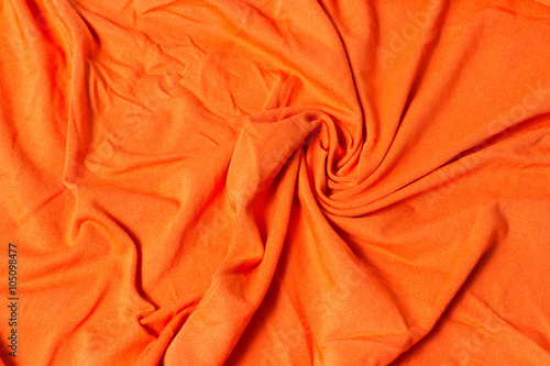 bright orange pleated fabric
