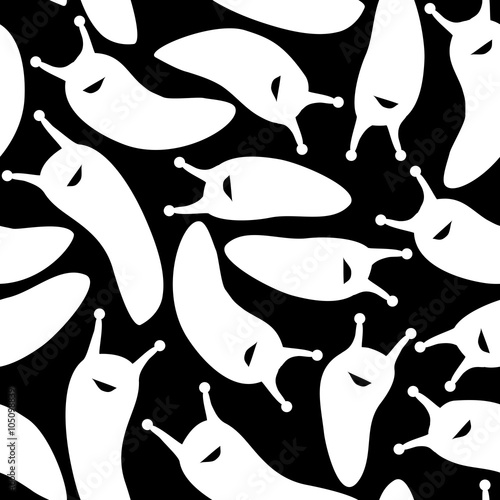 Seamless white slugs pattern on black background