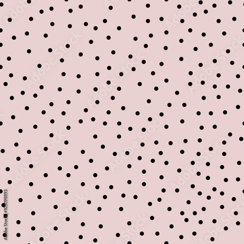 Black chaotic dots seamless pattern on pink background