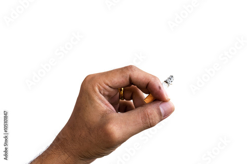 Cigarette in hand isolated on white background.