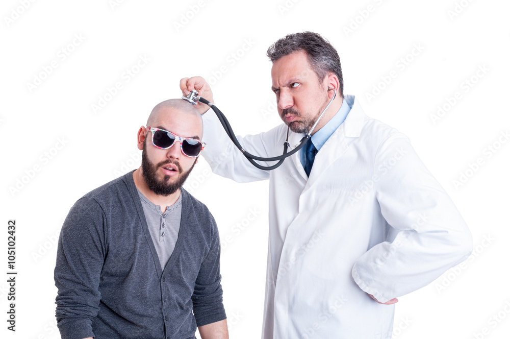 Male doctor consulting a crazy patient with stethoscope