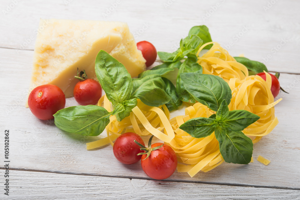 raw pasta, green basil and chesse raw pasta, green basil and chesse