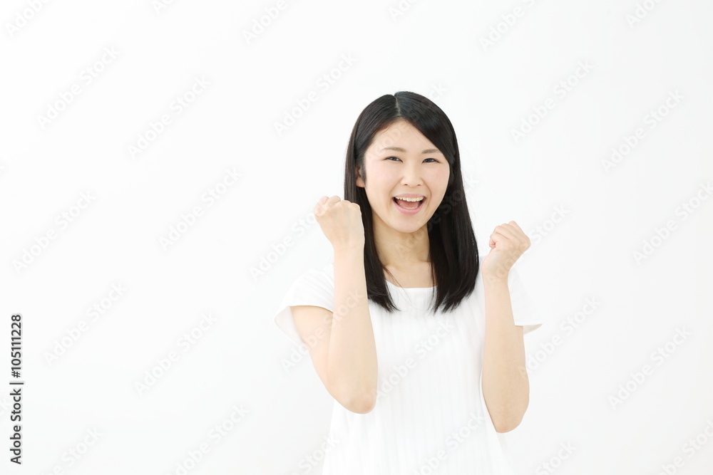 ガッツポーズ・若い女性 ガッツポーズ・若い女性