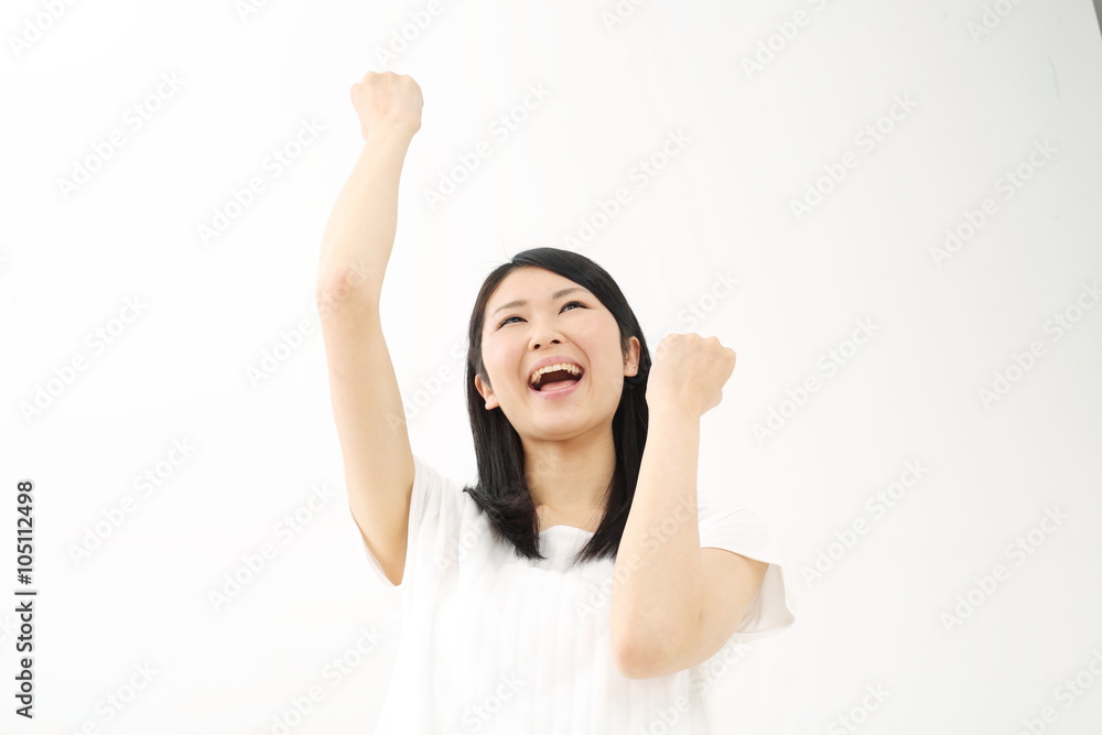 ガッツポーズ・若い女性 ガッツポーズ・若い女性