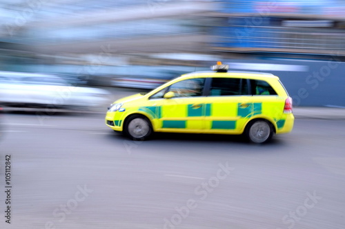 Blurred emergency car as a speed concept