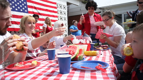 Family eating at 4th of July barbecue