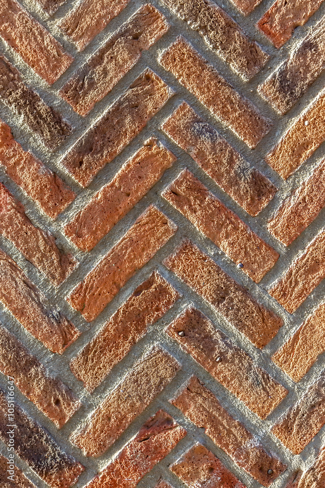 Brick wall. Red  texture. Herringbone (V-shaped pattern). Can be used as background