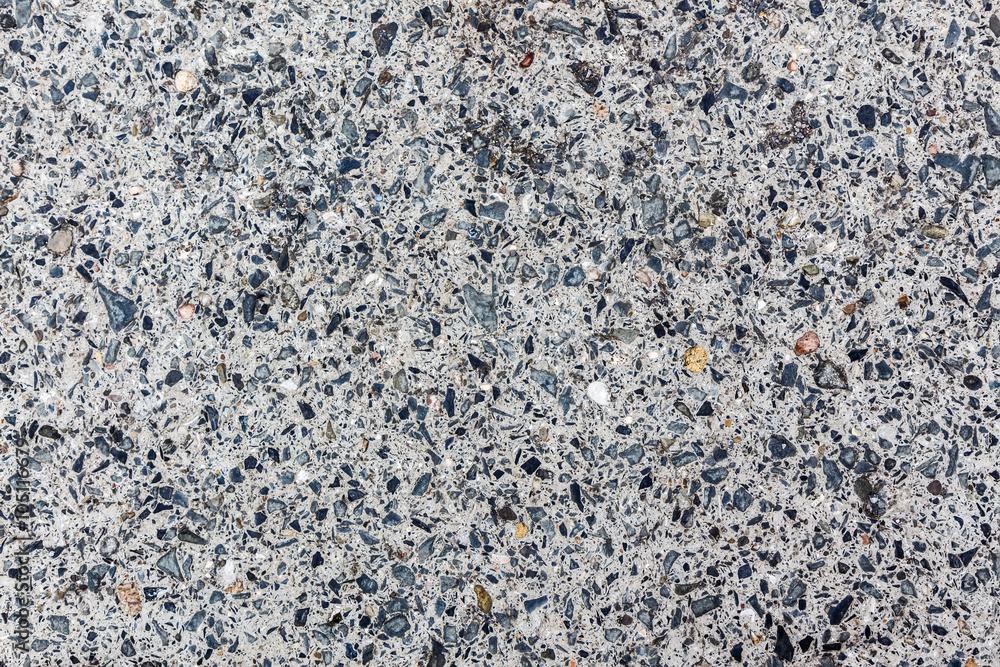 Stone slab with small inclusions. Grey texture. Can be used as background Stone slab with small inclusions. Grey texture. Can be used as background
