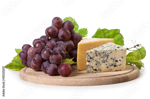 cheese and grapes isolated on white background