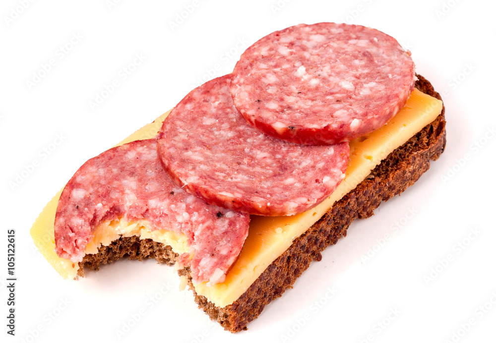 bitten sandwich with smoked sausage isolated on white background bitten sandwich with smoked sausage isolated on white background