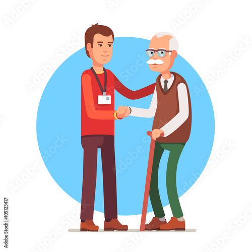 Social worker helping elder grey haired man