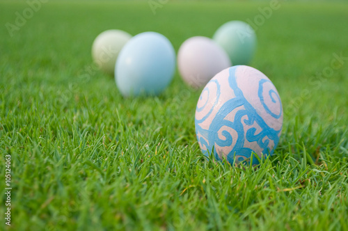 Easter eggs on green lawn