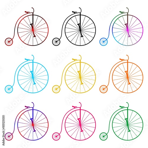 Set of colorful historic bicycles in a row and the row on a white background