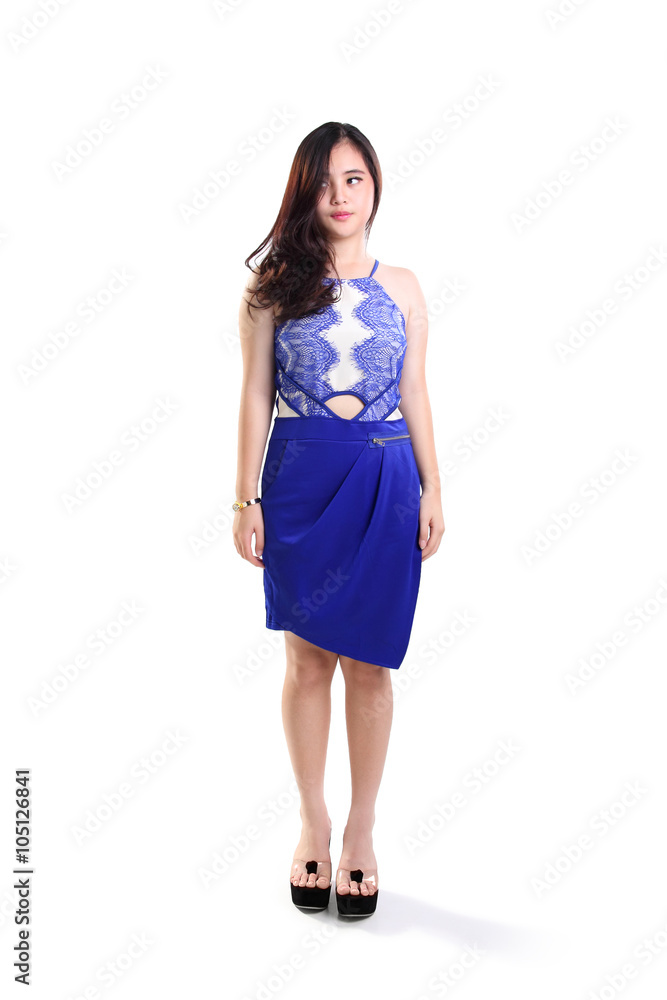 Elegant girl standing and looking sideways Elegant girl standing and looking sideways