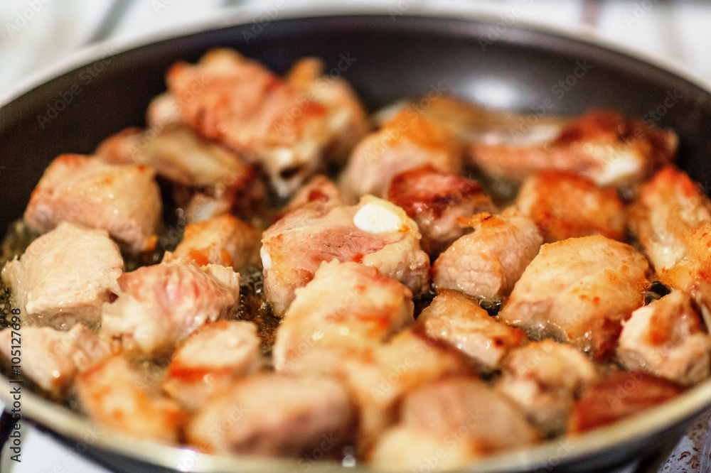 Pork on frying pan
