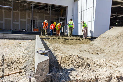 Newly installed road curb at parking lot.