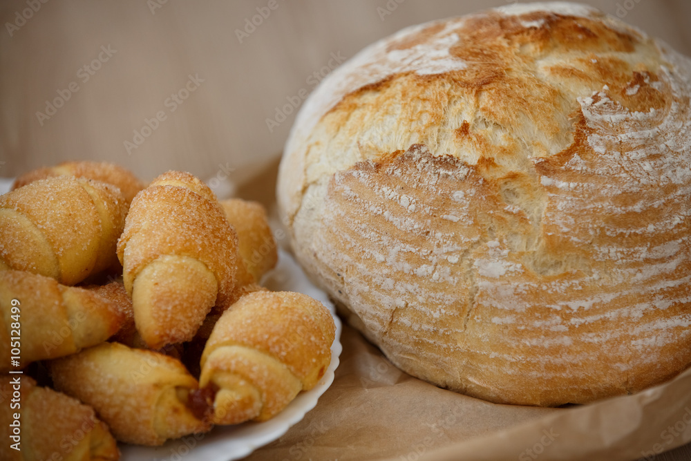 Fresh bread, closeup , soft grain and warm tonality Fresh bread, closeup , soft grain and warm tonality