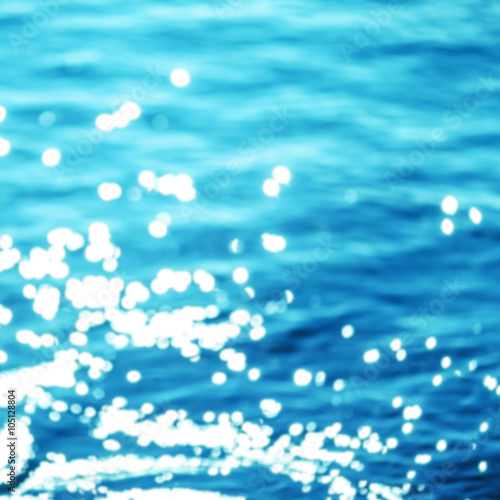Summer Background / Sparkles over blue water.